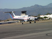 N90TP @ POC - Taxiing for take off at Brackett - by Helicopterfriend