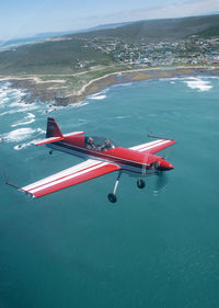N540MX - MX2 N540MX Flying over the Southernmost point of Africa - by Canzius Kleyn