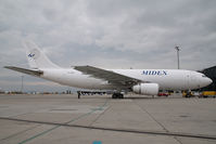A6-MDA @ VIE - Midex A300 - by Yakfreak - VAP