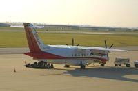 N330MX @ CID - Loading the team baggage - I don't know which U of Iowa team.
