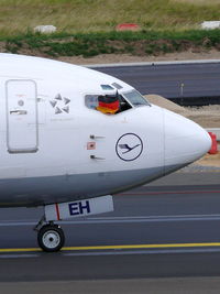 D-ABEH @ EDDL - Boeing B737-330 D-ABEH Lufthansa flying the German colors to support their team during WC Soccer - by Alex Smit