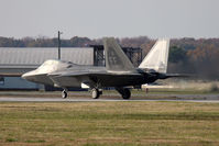 05-4085 @ LFI - F-22A Raptor 05-4085 sits in position on RWY 26 awaiting takeoff clearance to begin the 2009 Raptor Demo rehearsal. The pilot is the new Raptor Demo pilot for 2009. - by Dean Heald