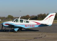 N1734G @ DTN - Parked at Downtown Shreveport with a B-52 from Barksdale Air Force Base in the background.
