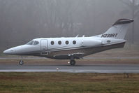 N239RT @ ORF - Sunset Aviation Inc Raytheon 390 Premiere I N239RT (FLT TWY239) rolling out on RWY 5 after arrival from Morgantown Municipal (KMGW) on a foggy/rainy afternoon in Norfolk, VA. The tower could not see the aircraft on the ground due to the fog. - by Dean Heald