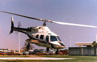 N22299 - Bell 222 at the Grand Prairie, Texas plant helipad - by Zane Adams