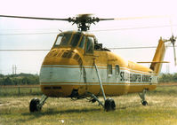 N887 - St Louis Helicopter Airways Sikorsky S-58 - Lifting roof top equipment at the General Motors plant in Arlington, TX - by Zane Adams