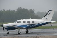 N3051B @ DTN - Rainy day at Downtown Shreveport. - by paulp