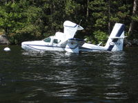 C-GFFB @ LAKE ROSSE - Floating next to a boat house at Lake Rosseau, ON - by Pieter Bastemeyer