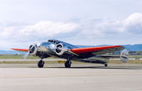 N72GT @ OAK - Linda Finch arriving back at Oakland CA upon completion of her world flight commemorating Earhart's 1937 attempt. - by Bill Larkins