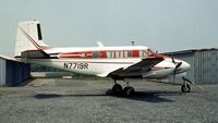 N7719R @ KUCA - This Twin Bonanza was seen at Oneida County Airport, New York State in 1976 - airport later closed in 2007. - by Peter Nicholson