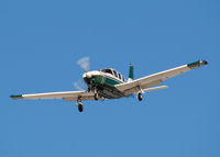 N90977 @ KAPA - Landing on 17L on a very windy day. - by Bluedharma