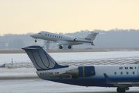 N425G @ CID - Departing runway 13.