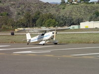 N8206B @ POC - Taxiing to display area/On display at Brackett/Flying in/Flying out - by Helicopterfriend
