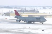 N673US @ CID - NWA9980 Runway 27 take-off roll. Wind 280@25-30 kt and I'm outside on the tower catwalk - by Glenn E. Chatfield