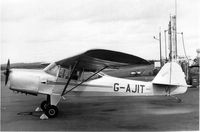 G-AJIT @ EGTE - Auster J/1N . Parked on tarmac in front of Aero Club hanager, circa 1964 - by RockyRowe