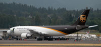N130UP @ KPDX - Sitting on the cargo ramp at PDX - by Todd Royer