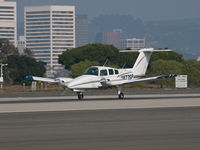 N877SP @ SMO - N877SP departing from RWY 21. She would return fourty minutes later with the left engine shut down and the prop feathered. - by Torsten Hoff