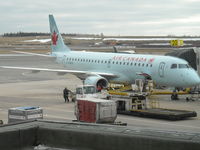 C-FMYV - Sitting at Gate 20 at YHZ, with aircraft C-GKGA in the background - by YHZAirplaneSpotter