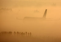 RA-64043 @ LOWS - Early morning impression with many spotters waiting for a sunny day. - by Andreas Müller