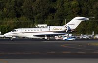 N915QS @ KBFI - KBFI (Seen here as a Netjets hack this Slicer is currently registered in Australia as VH-XCJ) - by Nick Dean