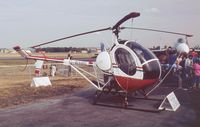 G-WHRL @ EGLF - Schweizer 269C  at Farnborough International 1990