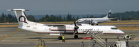 N418QX @ KSEA - Push back for departure