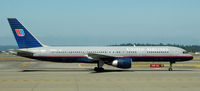 N533UA @ KSEA - Taxi to gate - by Todd Royer