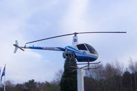 G-XIIX @ EGLK - R22 on Pole at entrance to Blackbushe