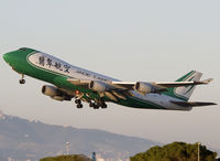 B-2421 @ LEBL - Taking off RWY 25L at dusk. - by Jorge Molina