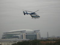 N117MK - N117MK flying as Health One in Houston TX near Reliant Stadium - by Don Dowling