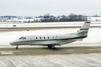 N698QS @ CID - Taxiing from Landmark to Runway 27 for departure - by Glenn E. Chatfield