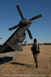 78-22985 @ ESN - pre-flight check of UH-60A - by J.G. Handelman