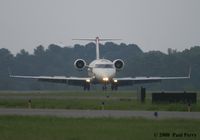 N710CA @ ORF - Turning off the active runway - by Paul Perry