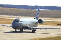 N948SW @ CID - Taxiing on Alpha 4 to the terminal - by Glenn E. Chatfield