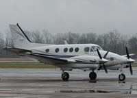 N104LC @ DTN - Parked at the Downtown Shreveport airport on a dreary, rainy, cold day.