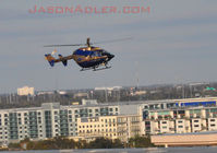 N911TG - This is the approach to the other photo landing. It was approaching the landing area and photographed over the Tampa Convention Center 2/7/09 - by Jasonbadler