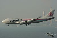 LX-FCV @ VHHH - Cargolux approaching 25R - by Michel Teiten ( www.mablehome.com )