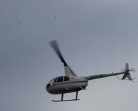 N137MT @ SAT - Robinson flying out of SAT - by Esteban Erik Stipnieks