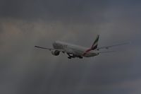 A6-ECF @ LOWW - EMIRATES Boeing 777-31HER climping out in very different weather - by Delta Kilo