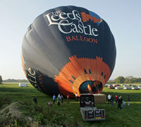 G-CDDC @ EGKH - Inflating for an evening flight from EGKH. - by Martin Browne