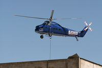 N4XY @ GKY - 5 State Helicopters Inc. S-58BT doing a HVAC lift onto a new warehouse near the airport in Arlington, TX