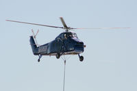 N4XY @ GPM - 5 State Helicopters Inc. S-58BT doing a HVAC lift onto a new warehouse near the airport in Arlington, TX
