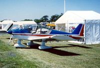 G-BXDT @ EGSX - On the Robin stand at the 1997 Aerofair at North Weald - by GeoffW