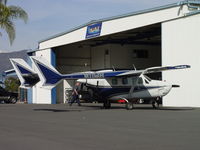 N11WS @ POC - Being worked on at NAI Aircraft Services at Brackett - by Helicopterfriend