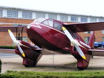 BAPC280 @ EGGP - Replica of a Dragon Rapide on display in front of the old Liverpool Airport, it used to wear the reg number G-ANZP - by Chris Hall