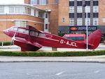 BAPC280 @ EGGP - Replica of a Dragon Rapide on display in front of the old Liverpool Airport, it used to wear the reg number G-ANZP - by Chris Hall