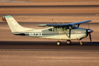 N8731X @ VGT - 1960 Cessna 182D Skylane N8731X rolling out on RWY 12R after landing.