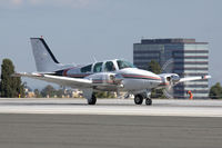 N3820M @ SMO - Baron Taking Off At SMO - by Curt Sletten