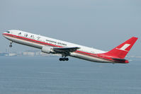 B-5018 @ RJTT - Shanghai Airlines B767 lifts out off Haneda - by Terry Fletcher