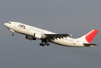 JA8527 @ RJTT - JAL A300 climbs out of Haneda - by Terry Fletcher